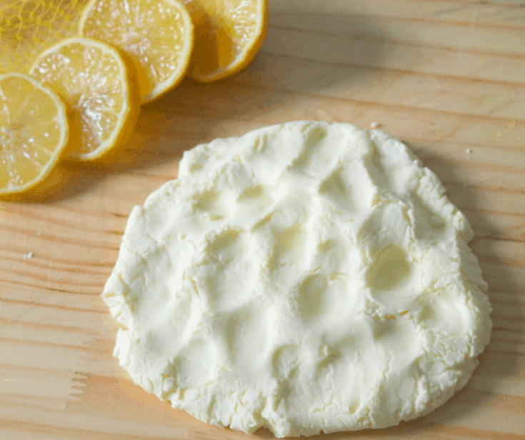 pic of lemon pudding slime and lemon slices on a counter