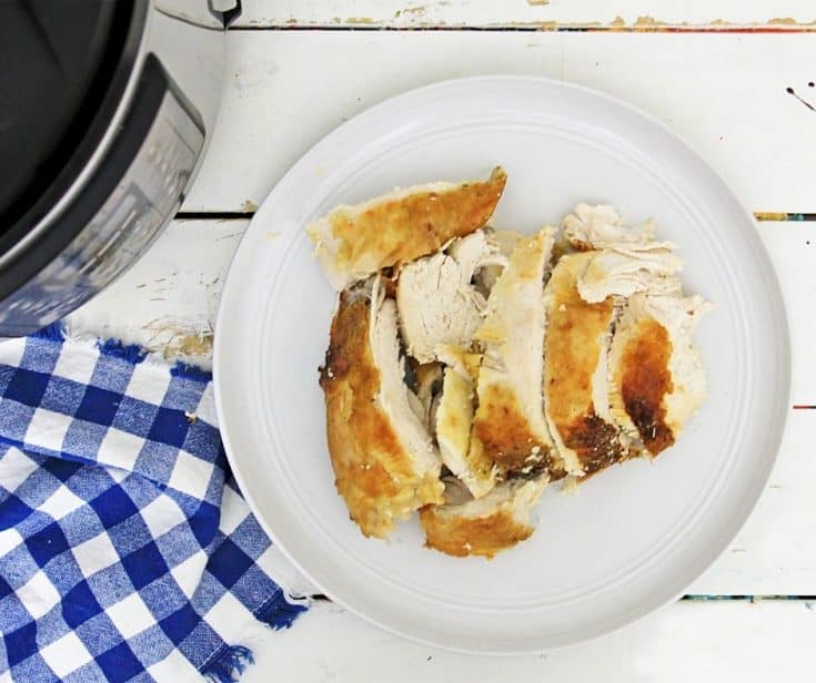 turkey breast from the Instant Pot on a white plate